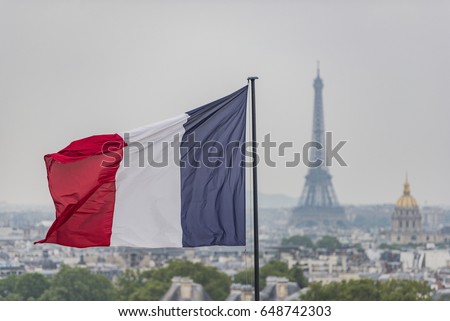 French flag and Eiffel Tower in Paris