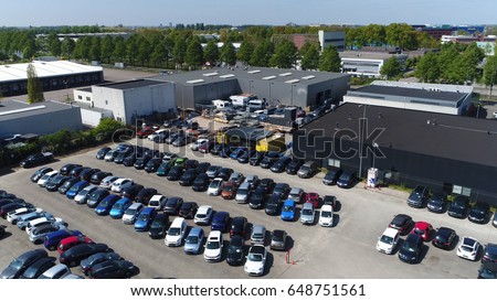 Aerial photo of small temporary car lot to store new cars for resale and car dealers who do not have free space for storage