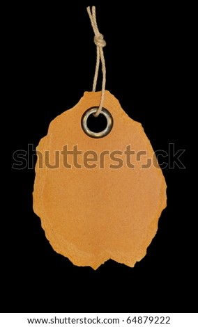 cardboard blank tag isolated on black background