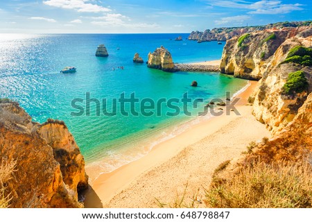Beautiful sandy beach near Lagos in Ponta da Piedade, Algarve region, Portugal Royalty-Free Stock Photo #648798847