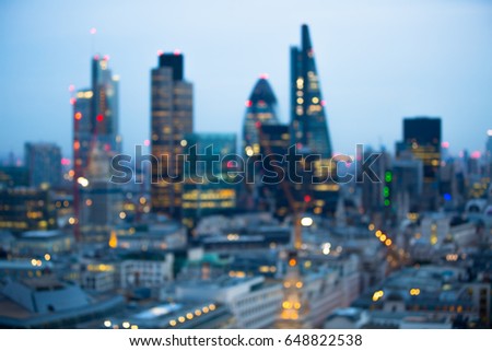 Night city of London view in blur. City street blurry photo, bokeh image. UK