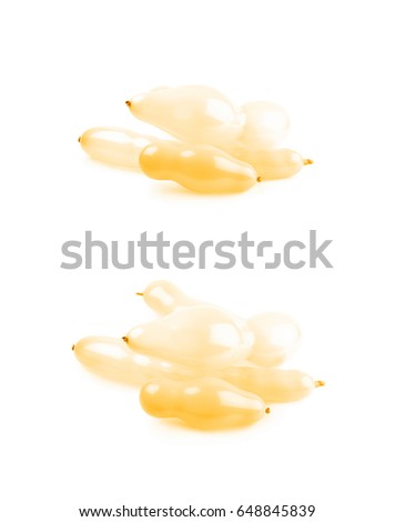 Pile of blown shaped balloons isolated over the white background, set of two different foreshortenings