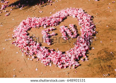 Pink heart-shaped Sakura on a beautiful central natural land in Thailand.