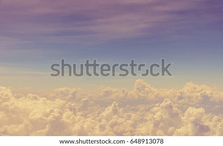 image of blue sky and white clouds on day time for background usage. (vintage tone)