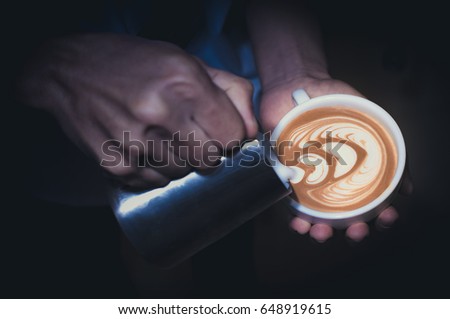 Barista hand making coffee Latte art 