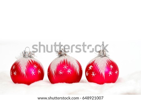 christmas red balls on snow