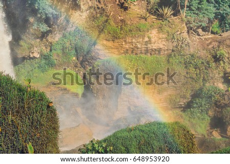 Bright rainbow at the Elephant Waterfall Dalat, Vietnam.