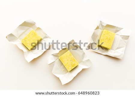 Bouillon cubes, isolated on white. Royalty-Free Stock Photo #648960823
