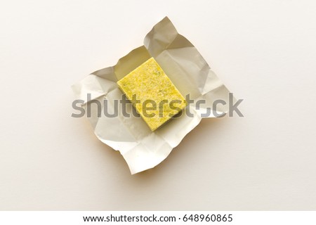Bouillon cubes, isolated on white. Royalty-Free Stock Photo #648960865