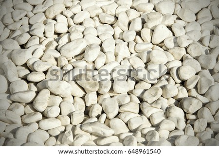 Natural background of white pebbles..