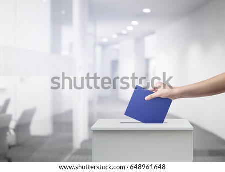 Woman person vote with ballot box at office voting concept. Royalty-Free Stock Photo #648961648