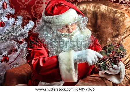 Christmas theme: Santa gifts, ina a interior.