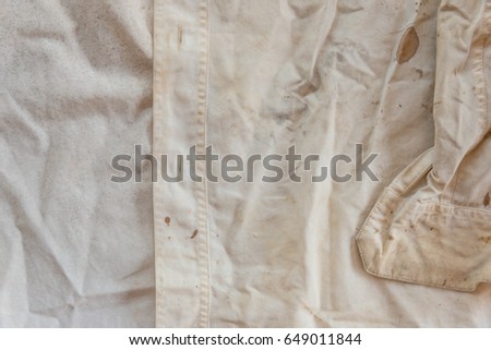 Very old rusty white shirt texture closeup for background use