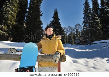 Snowboarder girl relaxing