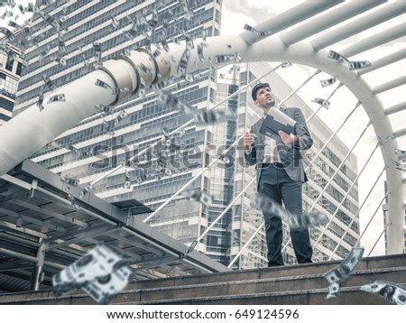 smart business man standing on top of step under money rain making dollar bills cash falling down. Stress free time management good earnings profit concept