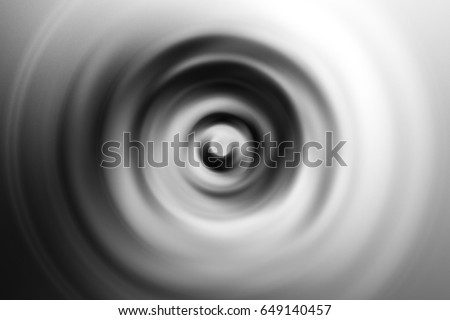 radial motion blurred conceptual abstract of sonic sound wave vibration, monochrome abstract background black and white