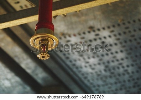 Automatic ceiling Fire Sprinkler in red water pipe System Royalty-Free Stock Photo #649176769