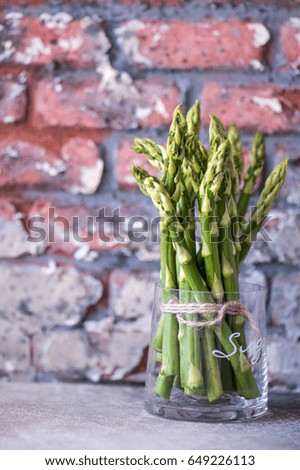 Fresh green asparagus in the glass