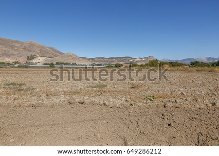 View of a landscape of an arid area of southern Spain, on a hot summer day