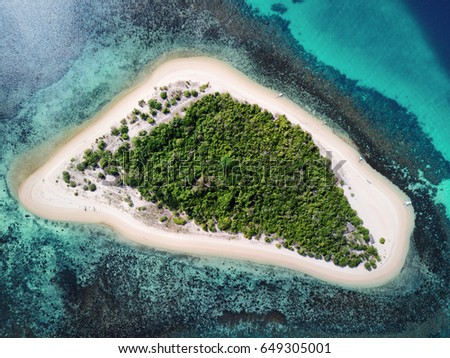 Aerial top view of tropical island surrounded by turquoise sea. Palawan May 2017 Royalty-Free Stock Photo #649305001
