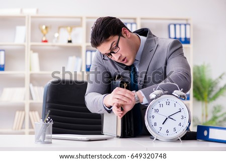 Businessman rushing in the office Royalty-Free Stock Photo #649320748