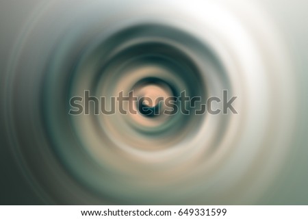 motion blurred abstract of ripple vibration wave from center