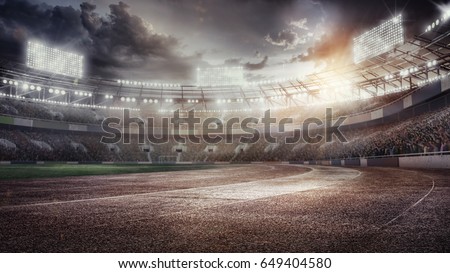 Sport Backgrounds.  Soccer stadium and running track. Dramatic scene. Royalty-Free Stock Photo #649404580