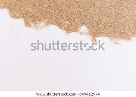Closeup of a pile sand on white background.Summer holiday relax background