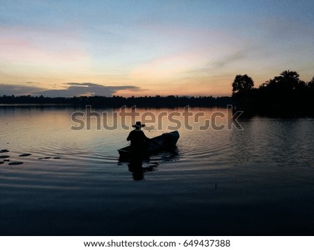 a fisherman on his boat 