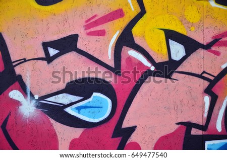 Beautiful street art graffiti. Abstract color creative drawing fashion colors on the walls of the city. Urban Contemporary Culture. Title paint on walls. Culture youth protest