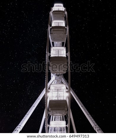 Ferris wheel profile at night