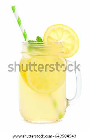 Mason jar glass of lemonade with straw isolated on a white background Royalty-Free Stock Photo #649504543