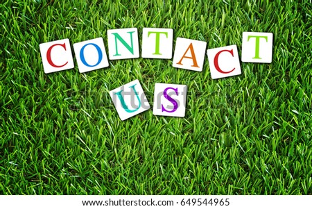 Website and internet contact us concept, customer service, icon on green grass background