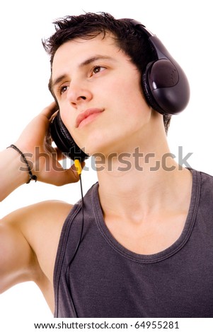 Young man listening music isolated on white