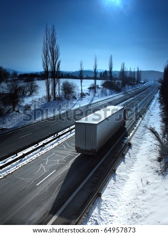 truck on the road Royalty-Free Stock Photo #64957873