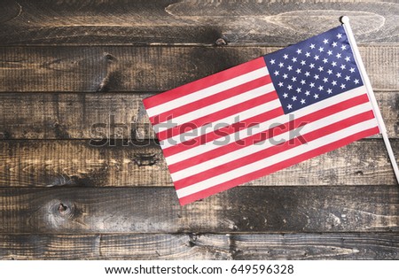 American flag on wooden background