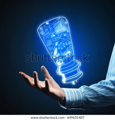 Close of businessman showing sketched idea in palm