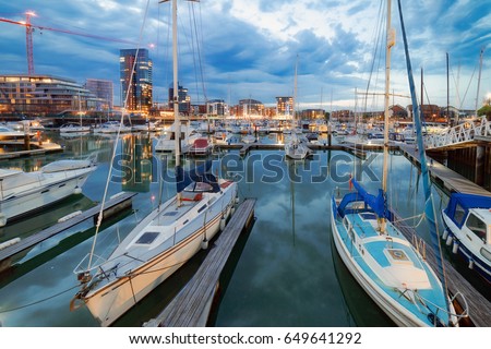 Twilight capture of Southampton's Ocean Village Marina on a warm evening. Royalty-Free Stock Photo #649641292