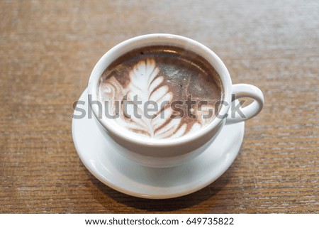 a cup of chocolate latte in cafe