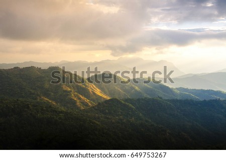 Mountain with warm light in Khao Kho, Phetchabun, Thailand. It is located in Khao Kho District, giving its name to the district. This mountain is part of the western range of the Phetchabun Mountains.