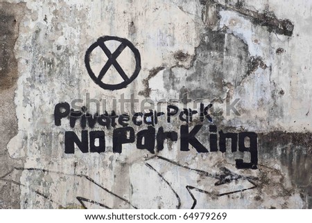 Hand painted no parking sign