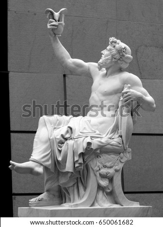 Head and shoulders detail of the ancient sculpture Royalty-Free Stock Photo #650061682