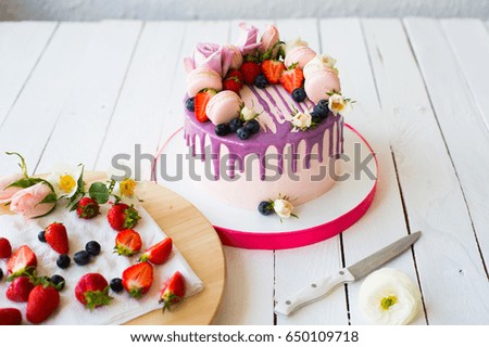 Colorful Ornate Cake with Macaron and strawberry