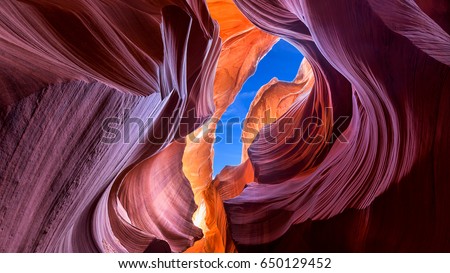 Beautiful wide angle view of amazing sandstone formations in famous Lower Antelope Canyon near the historic town of Page at Lake Powell, American Southwest, Arizona, USA Royalty-Free Stock Photo #650129452