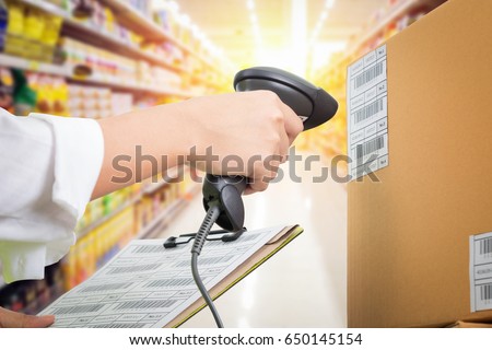 Supermarket Female cashier use code scanner, customer checkout Royalty-Free Stock Photo #650145154
