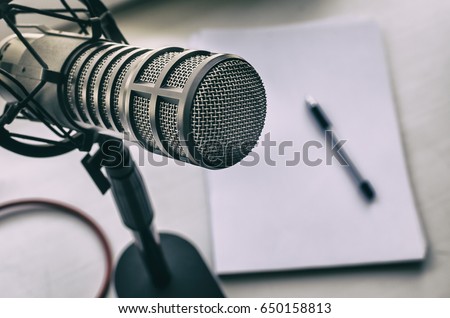 Microphone, sheets of paper and pen Royalty-Free Stock Photo #650158813