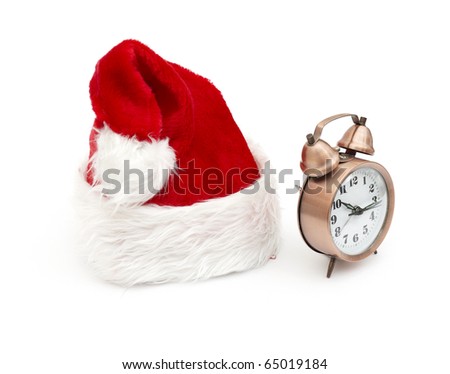 Alarm clock on the hat of Santa Claus