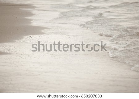 Soft wave of blue ocean on sandy beach,Background,landscape,water  blue sea.