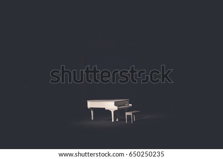 The grand white piano in a main hall concert.