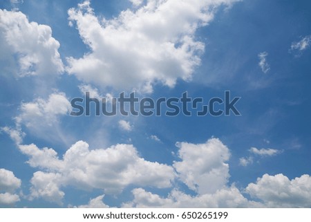 Blue sky with Cloud under the Sunshine in the Summer day